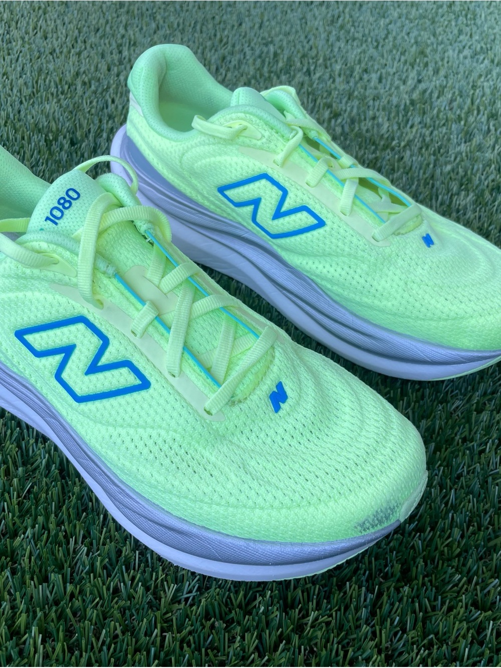 New Balance Neon Green Athletic Running Shoes with Blue Logo